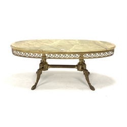20th century cast brass oval coffee table, with moulded onyx top over pierced frieze decorated with trailing acanthus leaves,  raised on four figural supports with paw feet united by reeded stretcher, 120cm x 50cm, H46cm