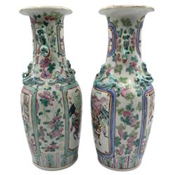 Pair Chinese Canton Famille Verte vases, each painted with reserves of officials and warriors on horseback, each with Dog of Fo handles and applied dragons to the shoulders, H25.5cm