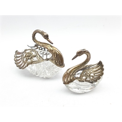 Pair of graduated glass Swan salts with pierced silver hinged wings and neck, import marks, larger swan L11cm