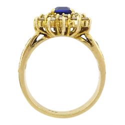 18ct gold octagonal cut sapphire and round brilliant cut diamond cluster ring, with diamond set shoulders, stamped 750, total diamond weight approx 1.10 carat