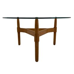 Mid to late 20th century teak coffee table, circular glass top on turned supports joined by angular tri-form stretchers 