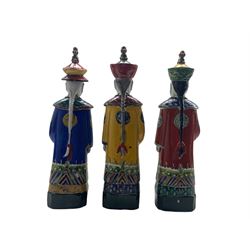 Three Chinese Republic figures 'The Three Emperors', each dressed in yellow, red and blue robes, some a/f H38cm 
