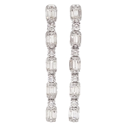 Pair of 18ct white gold baguette and round brilliant cut diamond pendant earrings, stamped K18, total diamond weight 1.60 carat