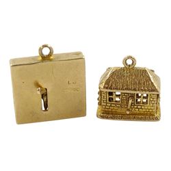 Two 9ct gold articulated charms including can-can dancers and 'Olde Smithy' blacksmith, both hallmarked