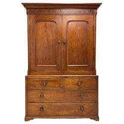19th century pitch pine housekeeping cupboard, projecting cornice over figured frieze, enclosed by two panelled doors, fitted with two short and two long drawers, on bracket feet