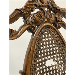 19th century stained walnut folding campaign chair, floral carved crest rail over spiral turned uprights, caned seat and back panel 