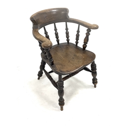 19th century stained elm and ash smokers bow armchair, with swept arms raised on spindle gallery, saddle seat over turned supports united by double 'H' stretcher, W63cm