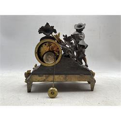 A French 19th century mantle clock depicting a farm boy with a plough at work beside a drum cased clock movement, spelter case with gilding in the rococo style, white enamel dial with roman numerals, minute markers and steel moon hands, with an eight-day countwheel movement striking the hours and half-hours on a bell. No pendulum.


