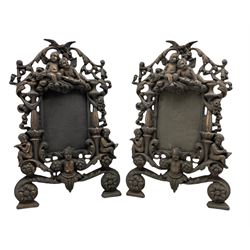 Pair of Victorian ornate iron photograph frames with a coppered finish and hinged struts Rd. No. 553836  37cm x 23cm  