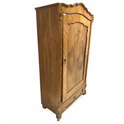 Continental walnut veneered wardrobe, arched top over panelled door enclosing interior fitted for hanging, one drawer to base, raised on block supports (W102cm, H186cm) together with a mirror of similar design (62cm x 173cm)