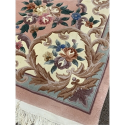  Chinese pink wool ground carpet with floral medallion and scrolled leaf border, 273cm x 400cm  