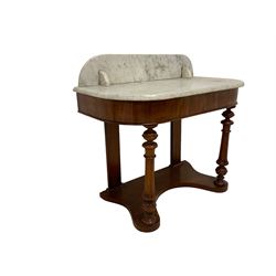 Late 19th century mahogany washstand, marble top with raised back, raised on turned and fluted supports joined by shaped base