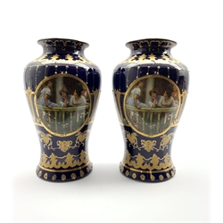 Pair of Vienna style baluster vases printed with panels of figures on a 'jewelled' blue ground H31cm