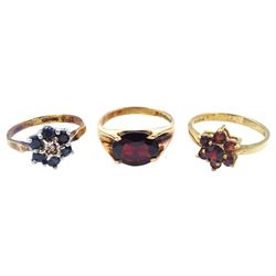 Single stone garnet ring, sapphire and diamond cluster ring and a garnet cluster ring, all hallmarked 9ct