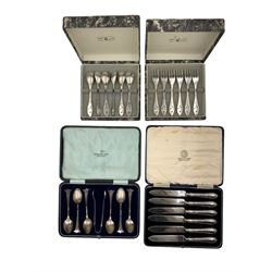 Set of silver tea spoons and tongs with fluted finials Sheffield 1918 maker Walker & Hall, cased, set of six silver handled pastry knives and set of six each Dutch Pleet decorative spoons and forks