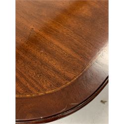 Regency design mahogany twin pillar dining table, the top with inlaid satinwood band over two turned columns with triple splay supports terminating in hairy paw brass cup castors, with one additional leaf 244cm x 114cm, H78cm