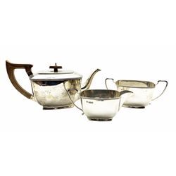 Silver three piece tea set of rectangular Art Deco design, the tea pot with stained handle and lift Sheffield 1931/2 Maker Charles James Allen 36oz gross