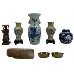 Chinese twin handled celadon ground vase, decorated in underglaze blue with a figure within a fenced garden, H25.5cm, carved and painted soapstone figure, Chinese prunus pattern ginger jar and cover, pair of Cloisonne vases with ebonised stands, decorative relief panel etc (9)