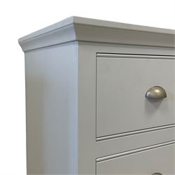 Contemporary white finish chest, fitted with two short over two long drawers, raised on plinth base