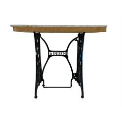 Singer painted cast iron table, with marble top
