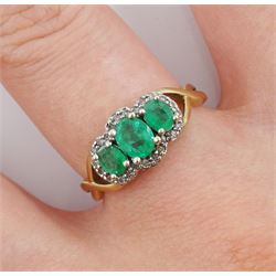 9ct gold three stone oval emerald and diamond cluster ring, hallmarked 