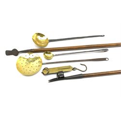 18th/ 19th century Kitchen Utensils, comprising a brass and iron skimmer and two similar brass and iron spoons, 19th century Dock or Daisy lifter, wrought steel head and pine handle, another similar garden tool and a set of Salters Spring Balance scales