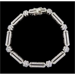 Silver cubic zirconia flower and oval link bracelet, stamped 925