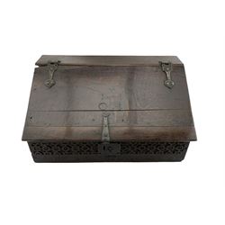 17th century oak bible box, the rectangular hinged lid carved with central cross over initials 'OB', the front carved with strapwork with central wrought metal lock, the sides decorated with carved lunettes and stylised acanthus leaves
