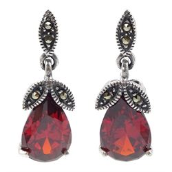 Pair of silver pear shaped red stone and marcasite pendant stud earrings, stamped 925
