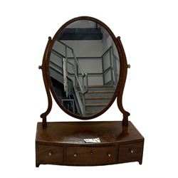 George III mahogany toilet mirror, plain oval plate, crossbanded base fitted with three drawers with ebony stringing