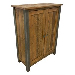 Rustic pine and metal two-door shoe cupboard, the interior fitted with sloped shoe compartments 