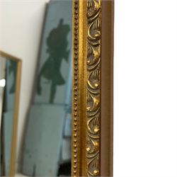 Gilt framed rectangular mirror, the frame decorated with stylised foliate band and beaded inner slip, plain mirror plate 
Provenance: From the Estate of the late Dowager Lady St Oswald