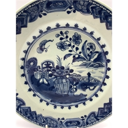 Two 18th century Chinese Export blue and white plates, each decorated with terrace scenes with flowers and butterflies, D23.5cm (2)