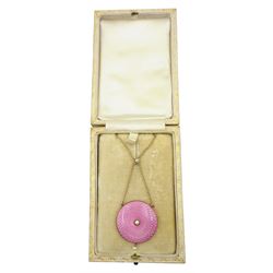 Edwardian 15ct gold circular pink guilloche enamel and pearl pendant, with glazed back containing a dried flower, on a fine link chain necklace, boxed 