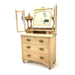 Edwardian satin walnut dressing chest, the top section fitted with three swing mirrors and two trinket drawers, three drawers to base, raised on castors, W126cm, H158cm, D46cm