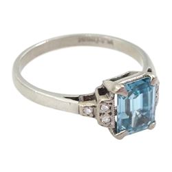Platinum Art Deco emerald cut blue zircon ring, with three milgrain set old cut diamonds either side, stamped platinum, zircon approx 1.90 carat