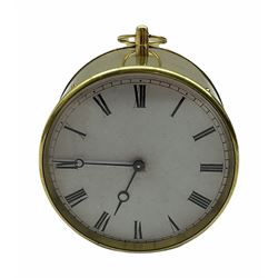 Mid-19th century French circular brass cased portable timepiece on three turned feet with circular carrying ring, removable rear cover with original instructions, dial bezel with bevelled flat glass, circular card dial with Roman numerals and minute track, steel moon hands, eight-day spring driven drum movement with a deadbeat “tick-tack” escapement and integral adjustable pendulum, wound and set from rear, movement backplate stamped “VAP Brevet SGDG”.  
Victor Athanase Pierret was born in Bucy-les-Pierrepont, France, in 1806 and died in 1893, working in Paris he was a prolific maker and exporter of clock movements mostly stamped with his initials VAP, exhibiting at the London Great Exposition of 1851 where he presented a 
