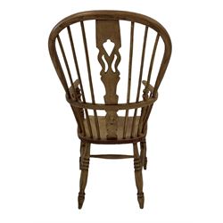Windsor chair, the splat and spindle back over saddle seat, raised on turned supports 