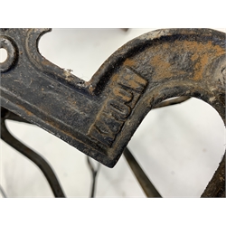 Set six late 19th century cast iron saddle racks, each with bridle hanging hook under, 