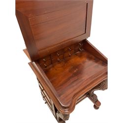Victorian style mahogany Davenport, the inset fall front opening to reveal interior fitted with drawers, raised on turned supports 