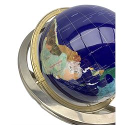 Table top terrestrial globe inset with semi-precious stones on a blue ground in metal frame with compass, H50cm