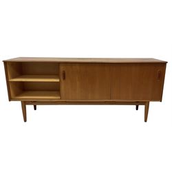 Nils Jonsson for Troeds - mid-20th century Swedish teak 'Cortina' sideboard, fitted with four central drawers flanked by sliding cupboards, raised on cylindrical tapering supports