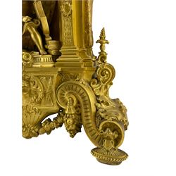Dupont a Paris – French baroque style gilt-metal case with an 8-day striking movement circa 1820, with a depiction of an angel in an alcove kneeling with weapons of war, silvered dial with Roman numerals and steel hands, twin barrel movement with a silk suspension, striking the hours and half hours on a bell.
With pendulum.
