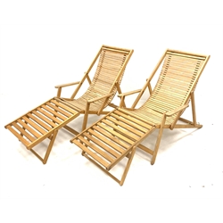Pair light oak folding garden sun loungers with removable foot rests