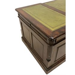 Georgian design mahogany twin pedestal partner's desk, shaped and moulded top with three leather inset writing surfaces, each side fitted with six drawers and panelled cupboard, canted upright corners with reeded quarter columns, on plinth base