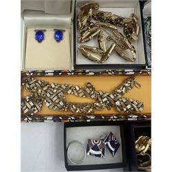 Group of Trifari jewellery, including a blue enamel and paste floral necklace, bracelet and earring set, a green, orange and white paste necklace and bracelet set, two necklace and clip earring sets and five pairs of earrings, together with a pair of Norwegian Andresen Scheinflug silver gilt and blue enamel clip earrings, another pair of clip earrings and a metal ring