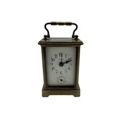 Early 20th century “Bayard” French timepiece carriage clock with alarm, complete with velvet lined carrying case, white enamel dial with Roman numerals and minute track, eight-day movement and original cylinder platform escapement.


