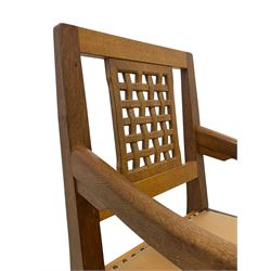 Rabbitman - oak elbow carver chair, pierced and carved lattice back, on octagonal supports united by H stretchers, carved with rabbit signature, by Peter Heap, Wetwang