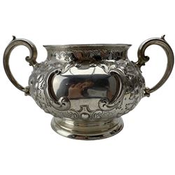Victorian silver two handled sugar bowl with embossed decoration, cartouche engraved with a monogram Sheffield 1859 Maker Martin Hall & Co