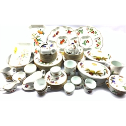 Comprehensive Royal Worcester Evesham dinner service comprising eight dinner plates, eight bowls, eight side plates, seven tea plates, two tureens, serving dishes, eight cups and saucers, ramekins, crudite dish and other pieces and a Royal Worcester Strawberries pattern Crudite dish 